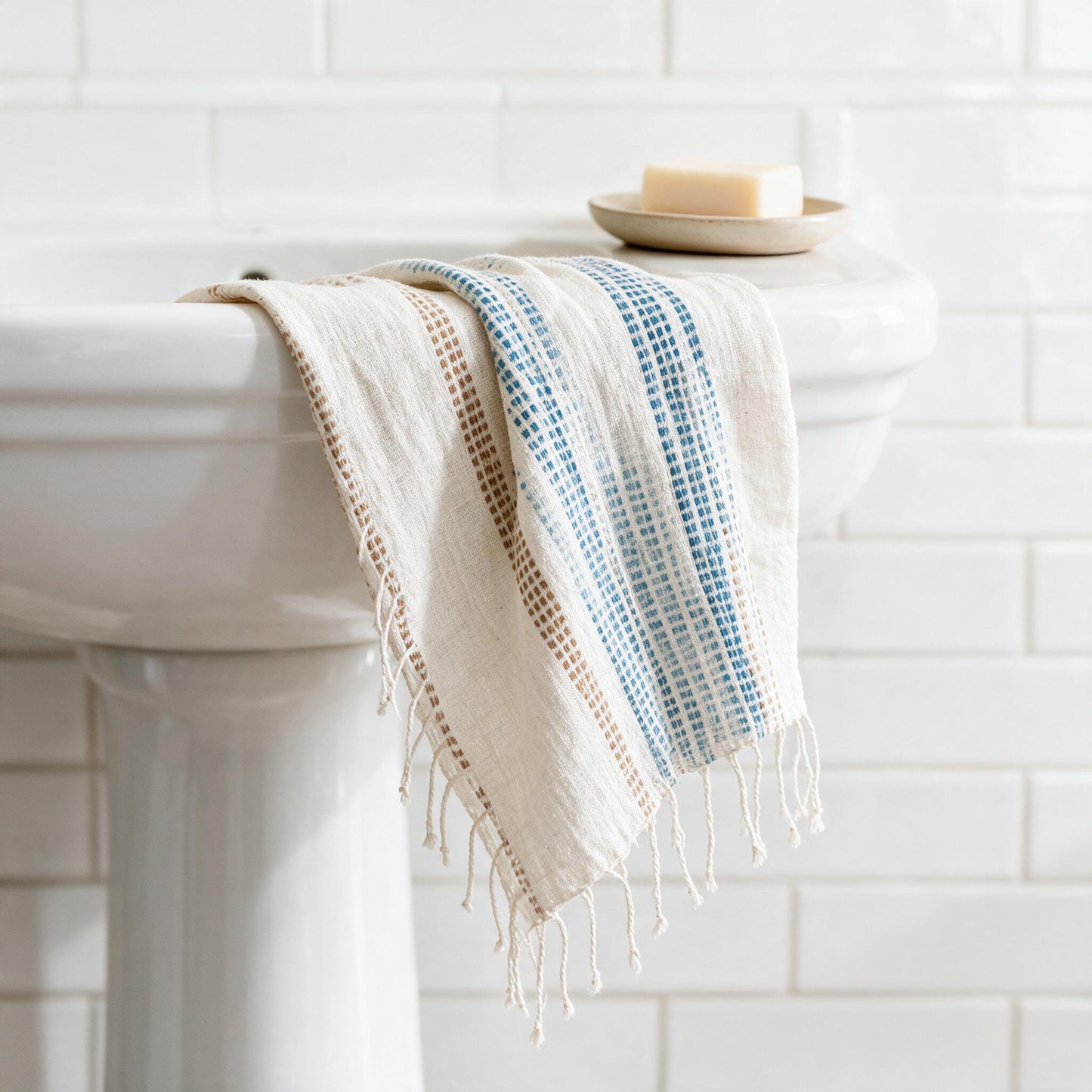 Camden hand towel on a pedestal basin