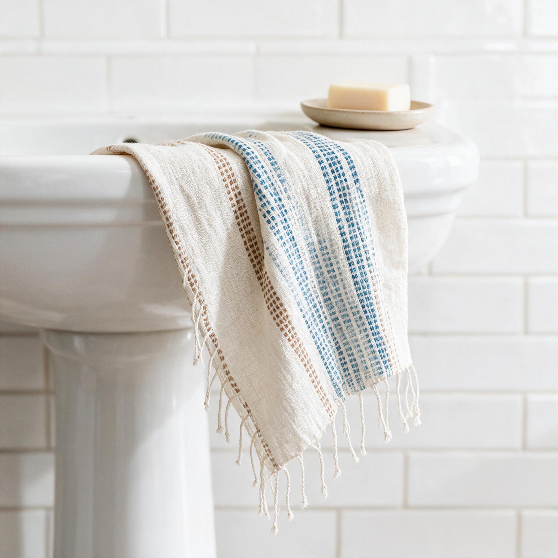 Camden hand towel on a pedestal basin