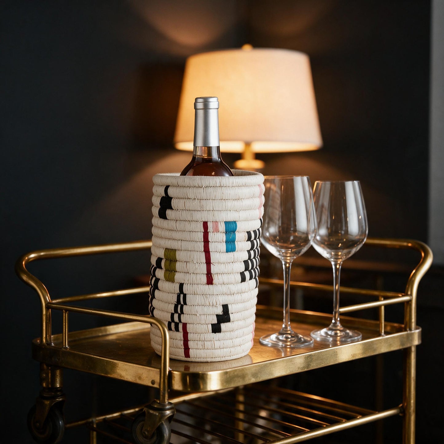 Mosaic woven wine holder on a bar cart